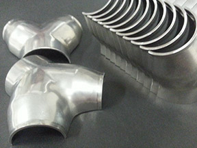 Tube segments. Formed from flat sheet stock. Custom-prepped for welding.